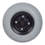 9x3 Rear Wheel Assembly for the Invacare Lynx L-3X mobility scooter, featuring a black rim and detailed hub, shown in a close-up.
