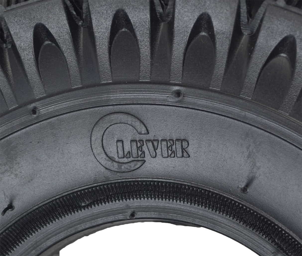 Close-up of the 10x3 (3.00-4, 260x85) Knobby Tire for Avigo Extreme Dirt Rider SC 3500 & Surge 36 Volt Off-road Electric Scooters, showcasing its aggressive tread pattern designed for enhanced off-road traction.