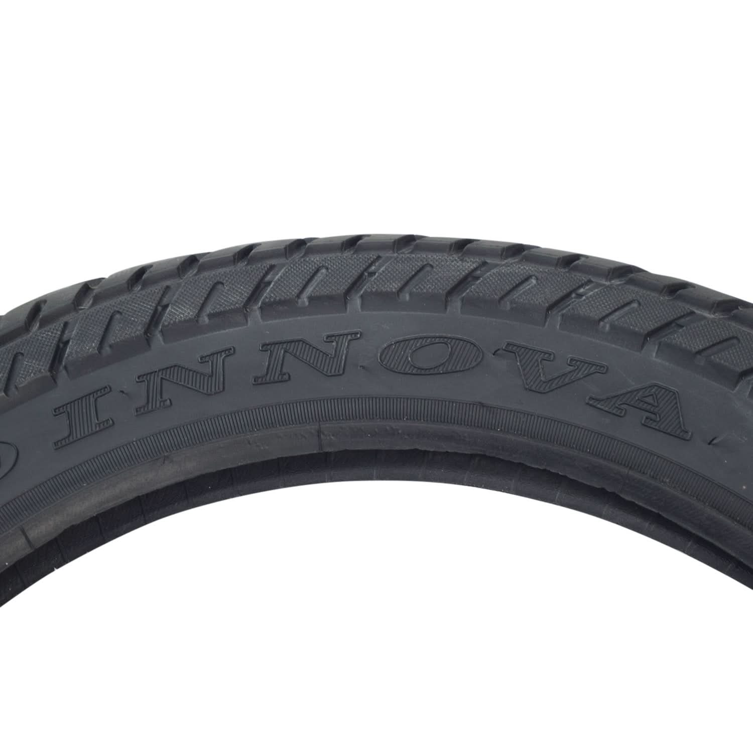 Close-up of a 16x2.50 (64-305) tire with HJ308 tread, showing directional arrows on the sidewall, designed for scooters and jogging strollers.