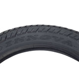 Close-up of a 16x2.50 (64-305) tire with HJ308 tread, showing directional arrows on the sidewall, designed for scooters and jogging strollers.