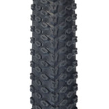 Close-up of the 14x2.125 (57-254) Pneumatic Tire for Electric Bikes, showcasing its knobby tread designed for optimal performance on both soft ground and hard concrete.