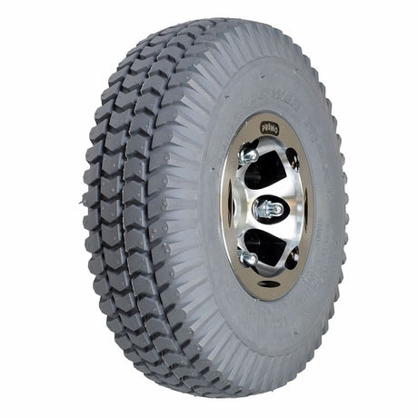 Close-up of the Foam Filled Rear Wheel Assembly for the Ranger XT550 and Solo Series Mobility Scooters, highlighting the tire tread and wheel rim.