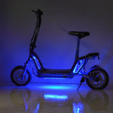 Multi-Color LED Light Kit for Recreational Scooters, showcasing a scooter with blue lights, highlighting a close-up of a wheel and reflective wet floor, emphasizing the vibrant and customizable lighting effects.