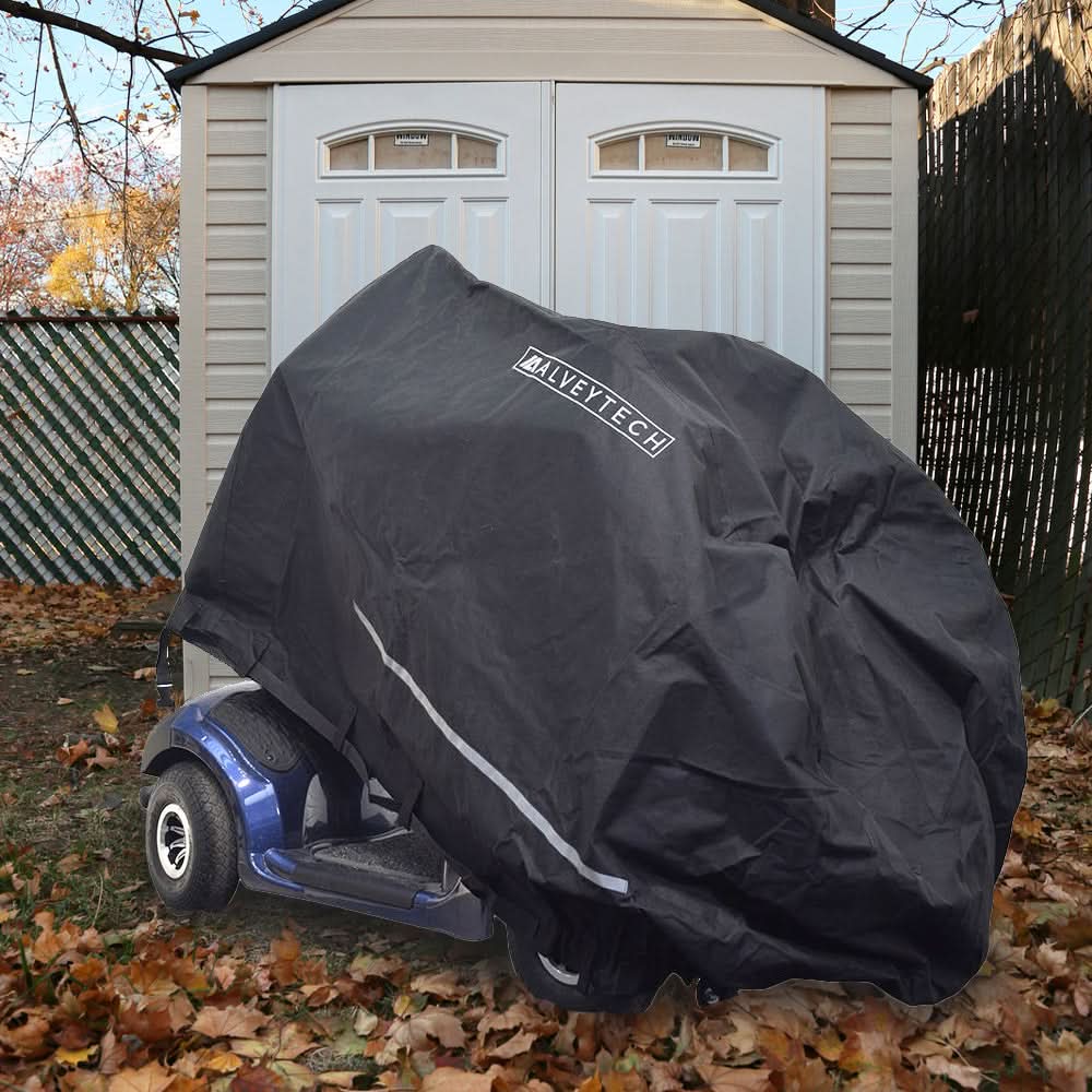 Heavy Duty Weatherproof Cover for Mobility Scooters: a black cover securely fits a small electric scooter, protecting it from the elements.