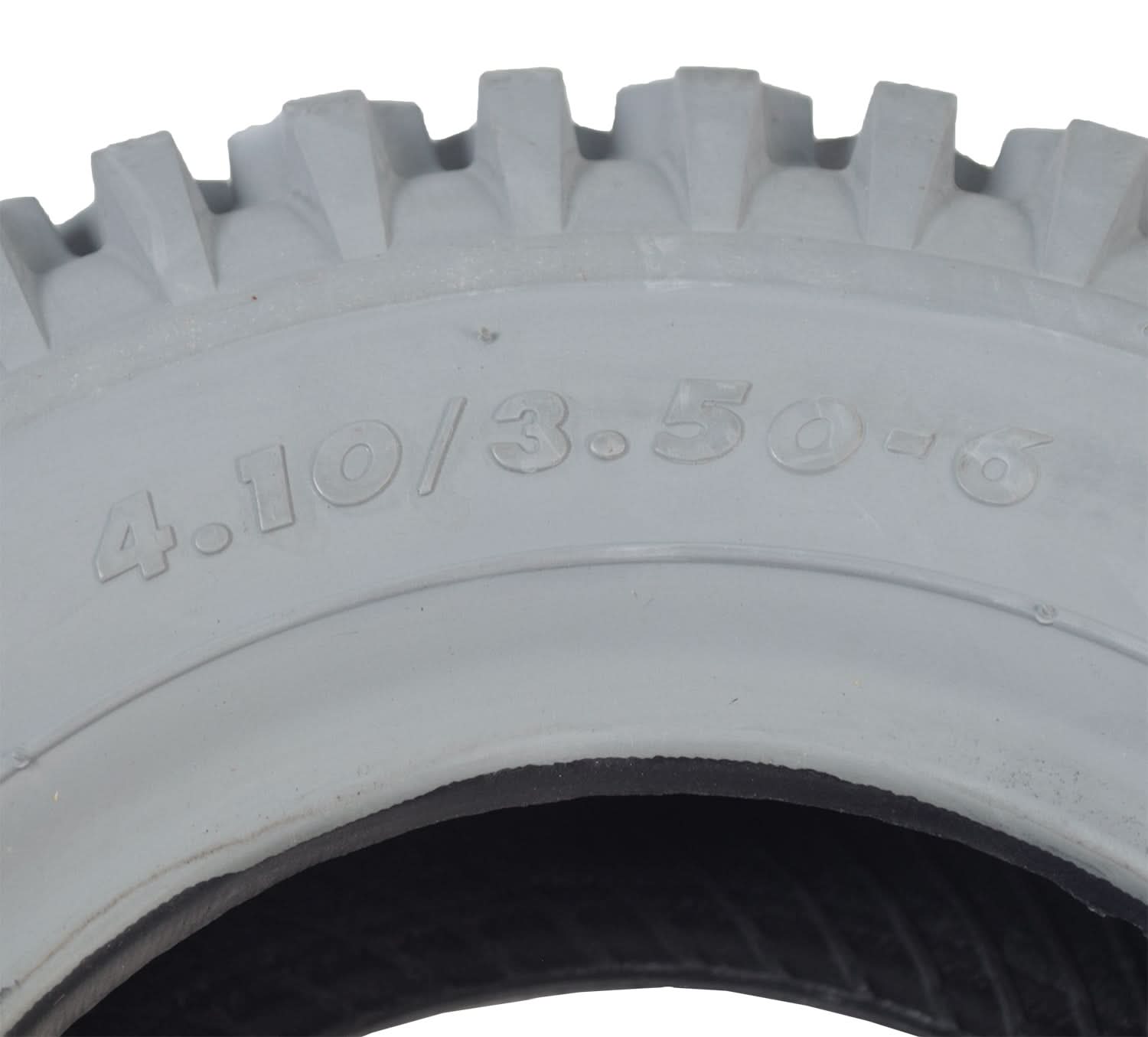 Close-up of the 4.10/3.50-6 Pneumatic Mobility Tire with C156G Nimble Knobby Tread, showing detailed treads and part of the tire's sidewall design, emphasizing its durability for scooters and power chairs.