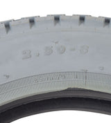 Close-up of the 2.50-8 Pneumatic Mobility Tire with C177G Power Plant Tread, highlighting the detailed knobby tread pattern and tire structure.