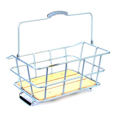 Quick Release Rack Top Woody Basket features a metal construction with a wooden handle, mounted on a bike's rear rack using spring-loaded clamps, ideal for carrying gear or lunch.