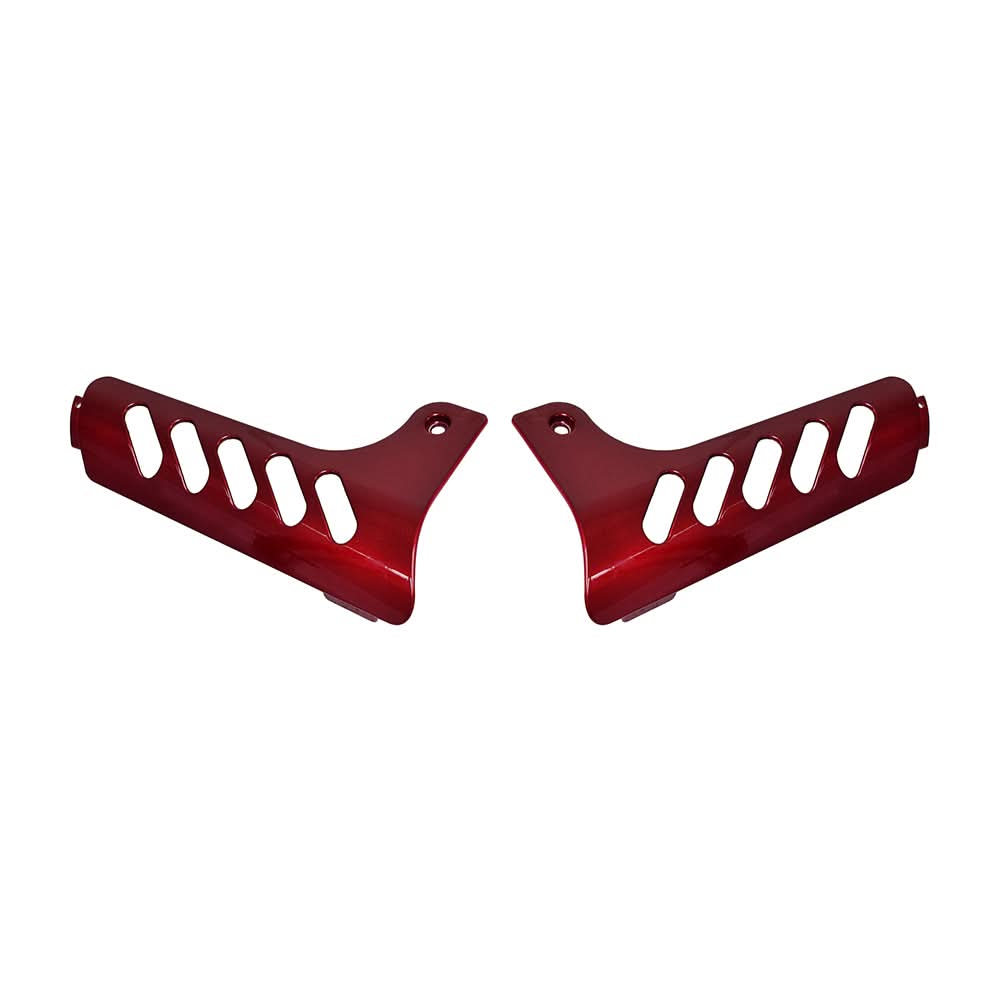 Front Shroud Insert for the Drive Medical Phoenix Series Scooters: A close-up of two red metal parts with decorative cut-outs, designed to replace worn shrouds and enhance the scooter's aesthetic.