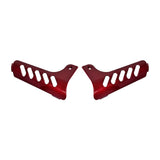 Front Shroud Insert for the Drive Medical Phoenix Series Scooters: A close-up of two red metal parts with decorative cut-outs, designed to replace worn shrouds and enhance the scooter's aesthetic.