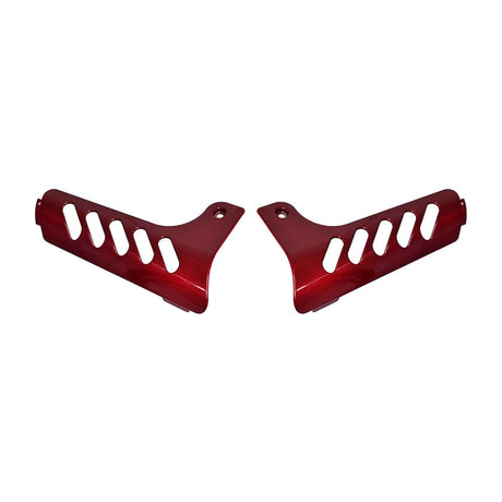 Front Shroud Insert for the Drive Medical Phoenix Series Scooters: A close-up of two red metal parts with decorative cut-outs, designed to replace worn shrouds and enhance the scooter's aesthetic.