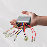 ZK2430D-FS Control Module with 4-Wire Throttle Connector for Razor E300 (Versions 20+), held in a hand, showing visible wires and connectors.